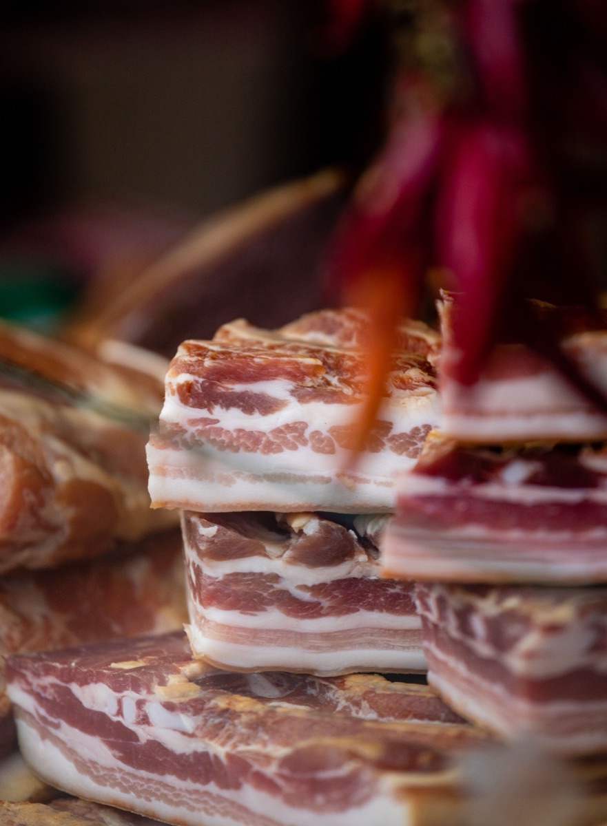 Stacked slabs of cured pork belly